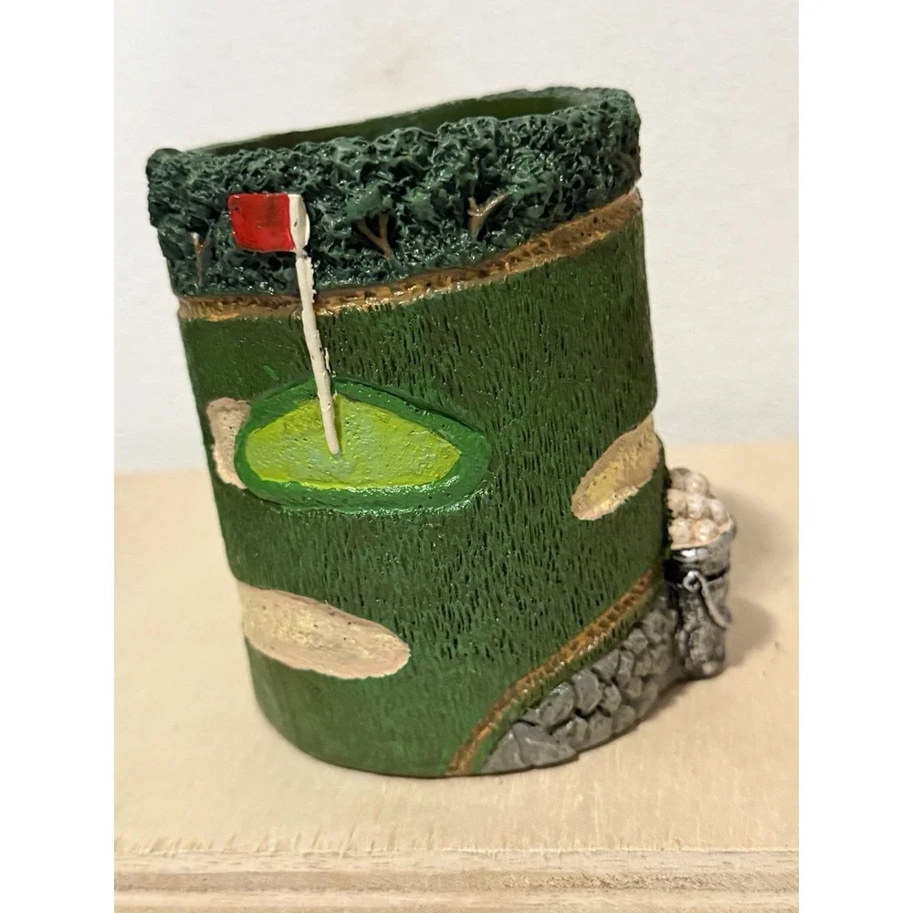 Figi Graphics golf-themed resin bank or pencil holder